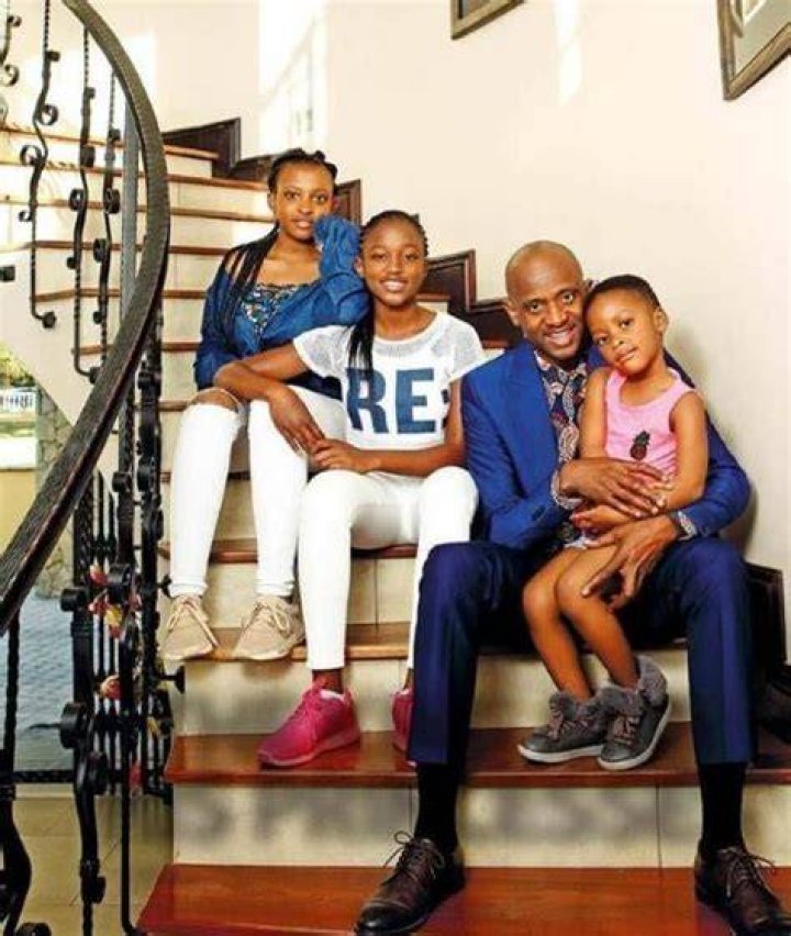 Arthur Mafokate with his daughters