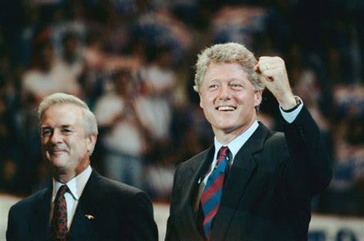 Bill Clinton Arms Raised