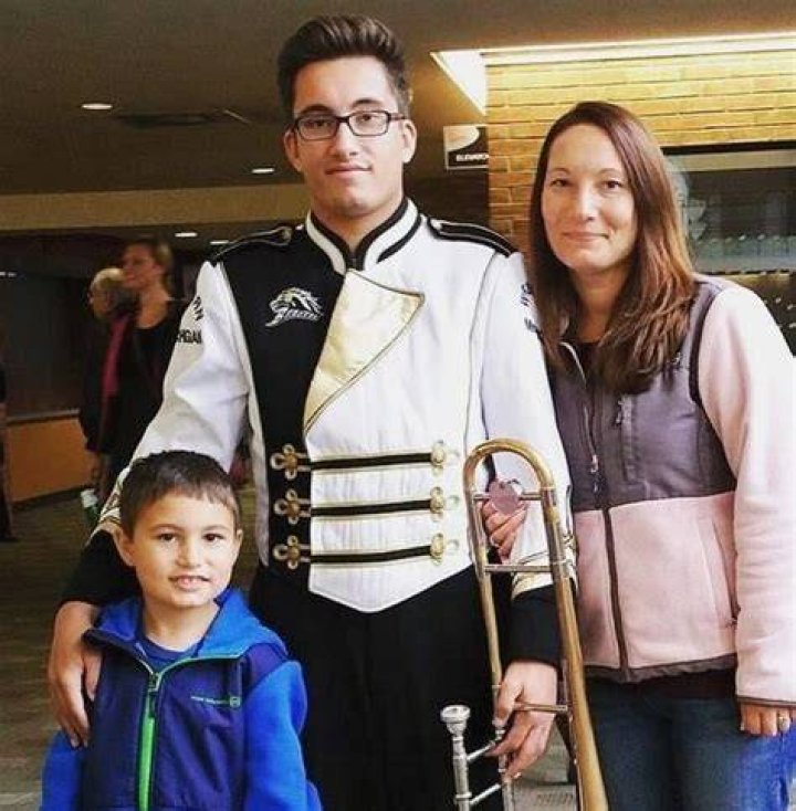 Caleb Hammer with his mother and younger brother