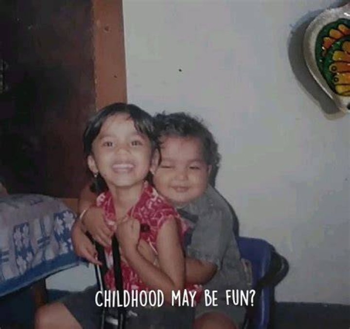 Childhood photo of May
