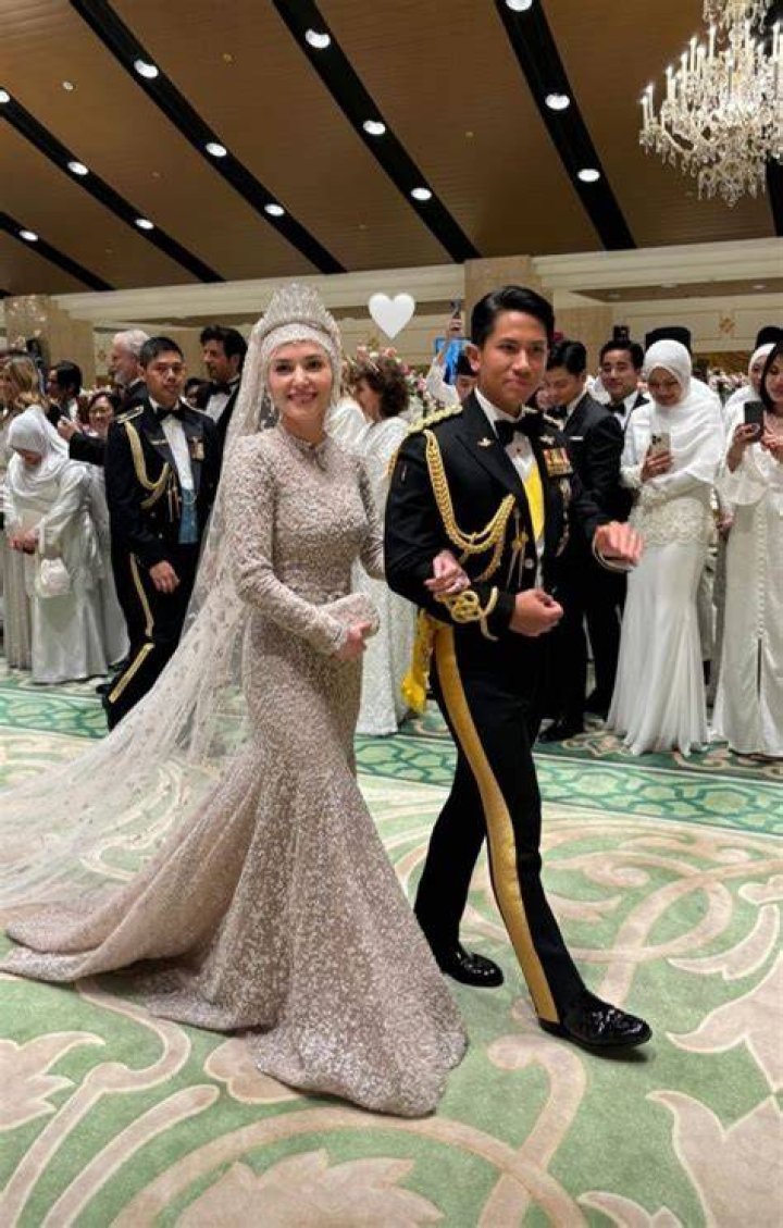 Dayang Anisha Rosnah Isa-Kalebic with her husband