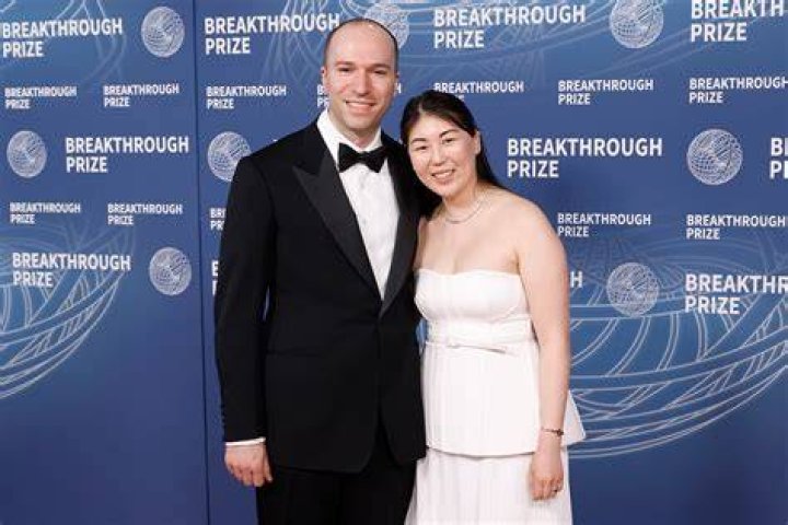 Greg Brockman with his wife Anna Brockman