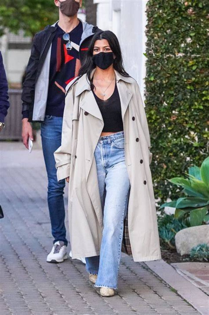 Kourtney Kardashian tan trench coat