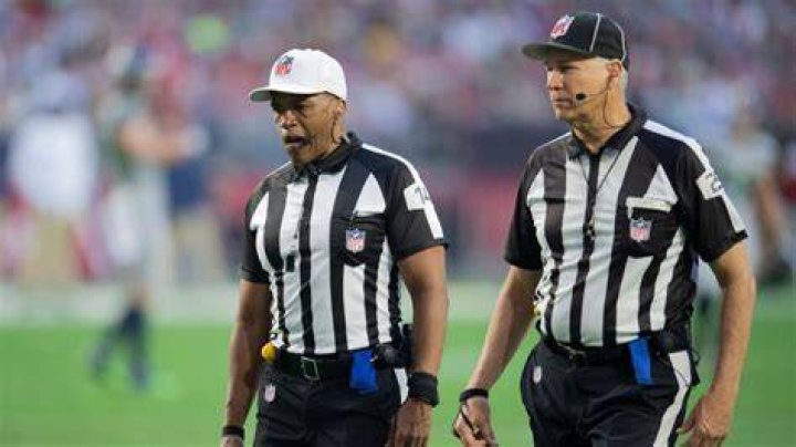 NFL Photos Ref Tackle
