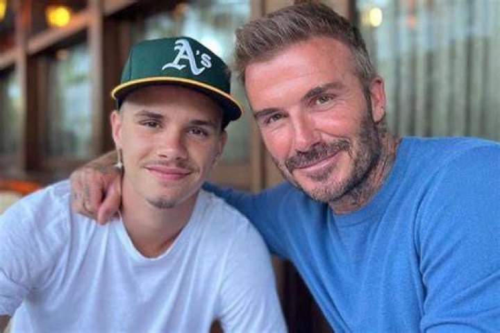 Romeo Beckham with his dad and siblings