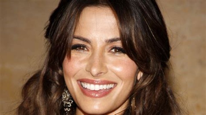 Sarah Shahi played the role of cheerleader in Dr. T and the Women in Texas