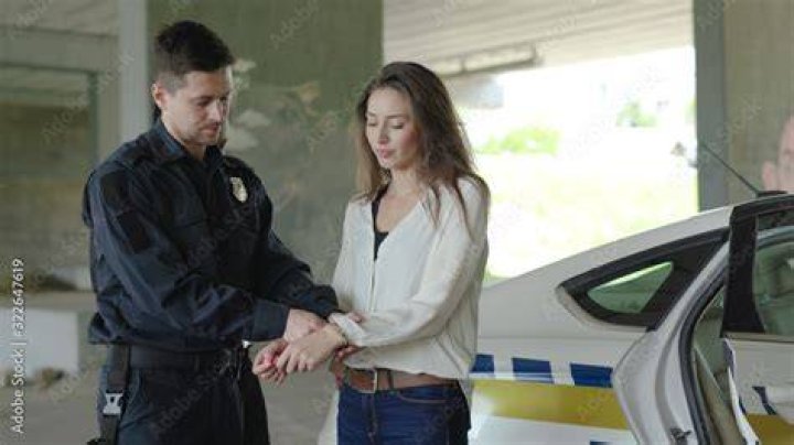 Woman Being Arrested During Move Bombing